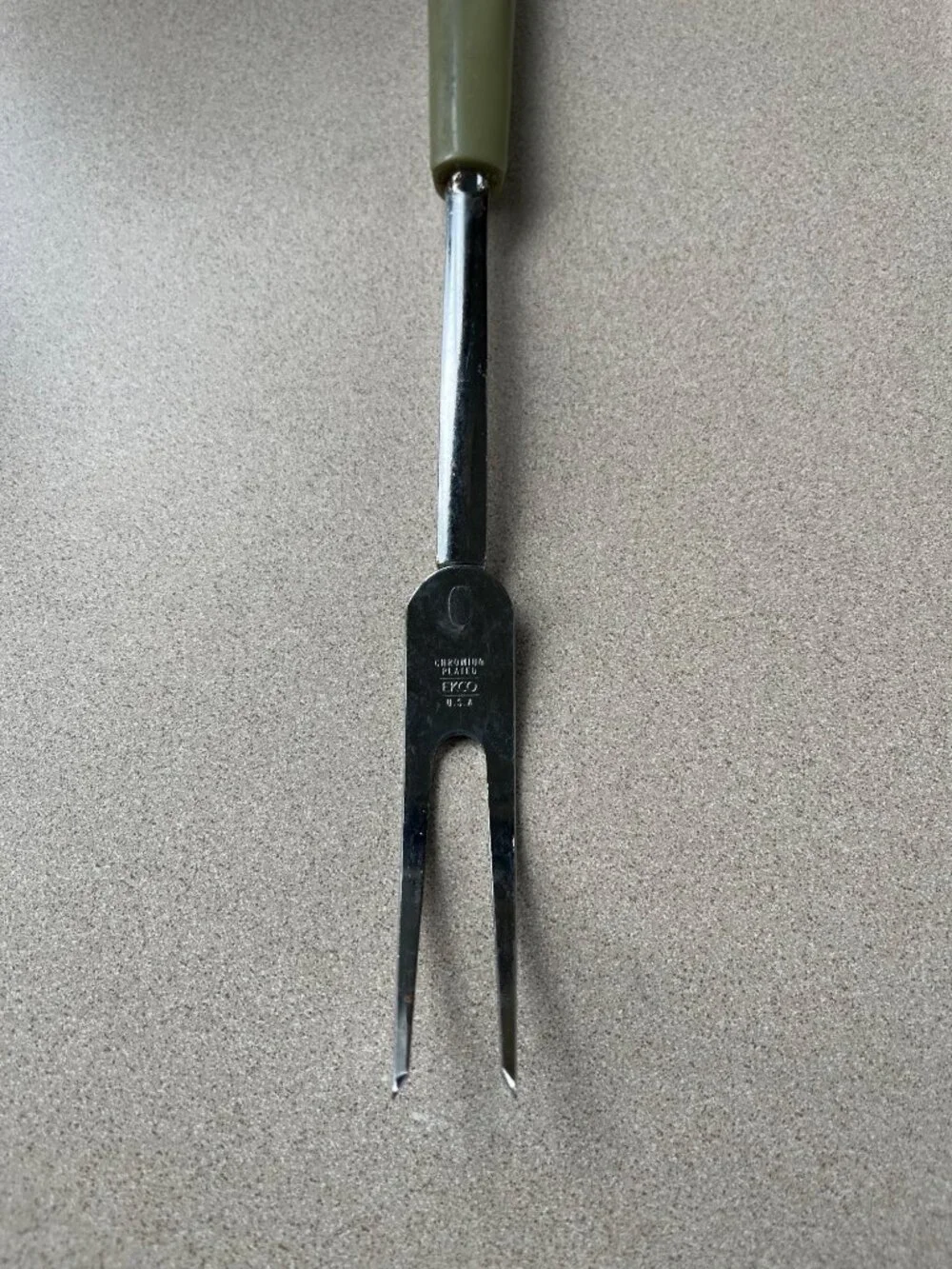 Ekco Avocado Green Handled Meat Fork, discoloration handled back
